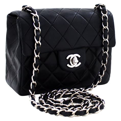 black Chanel bag silver chain